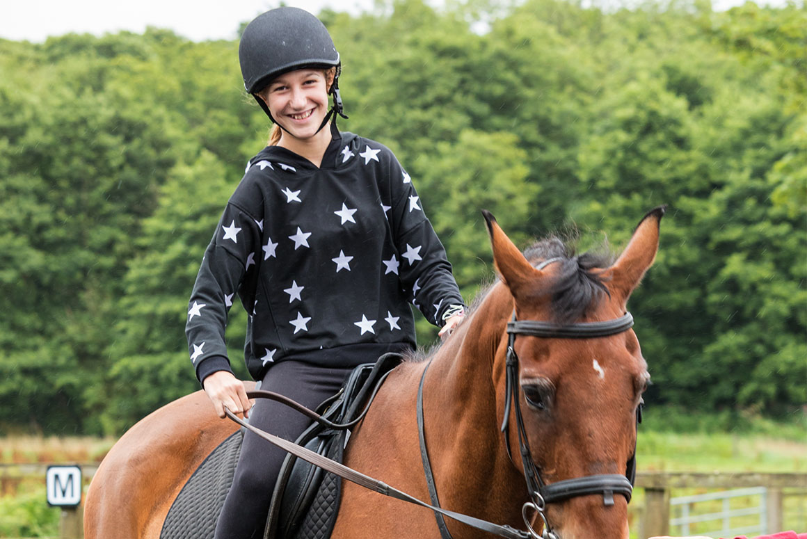 Bucksmore student riding a horse at King Edward's Witley