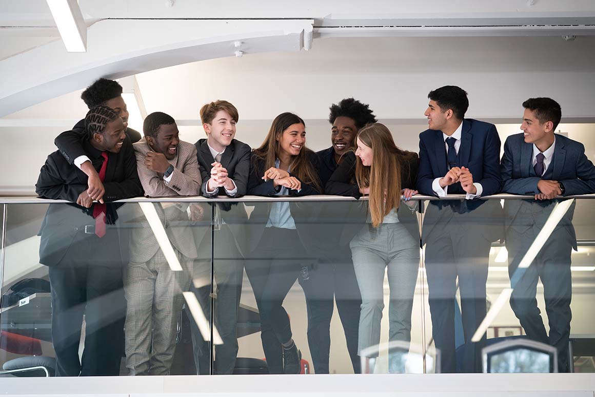 Tettenhall College students standing on a balcony together