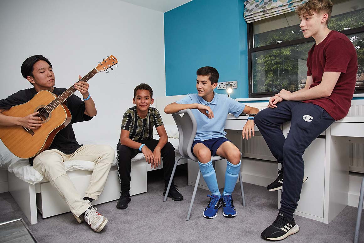 Luckley House School boarding students relaxing in boarding house