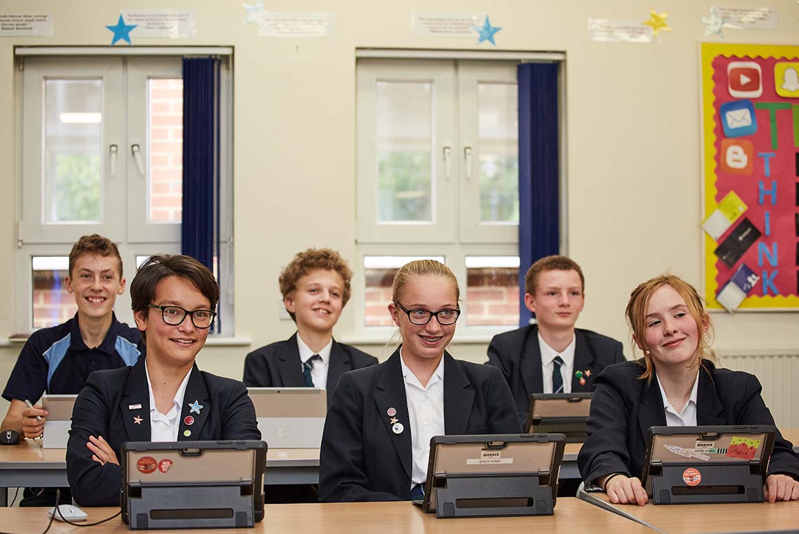 Luckley House School students in classroom with tablet computers