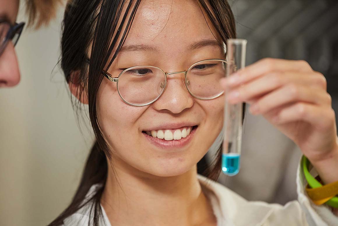 International student at Luckley House School with vial