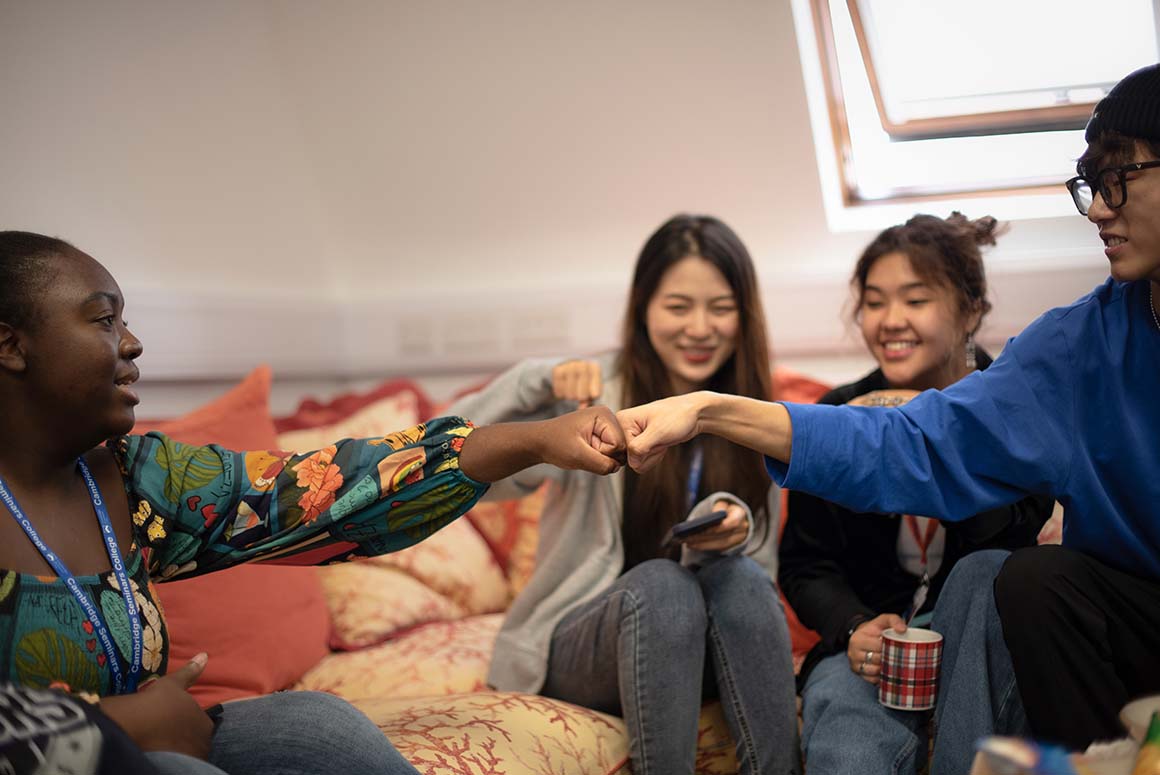 Cambridge Seminars College students talking in the common room