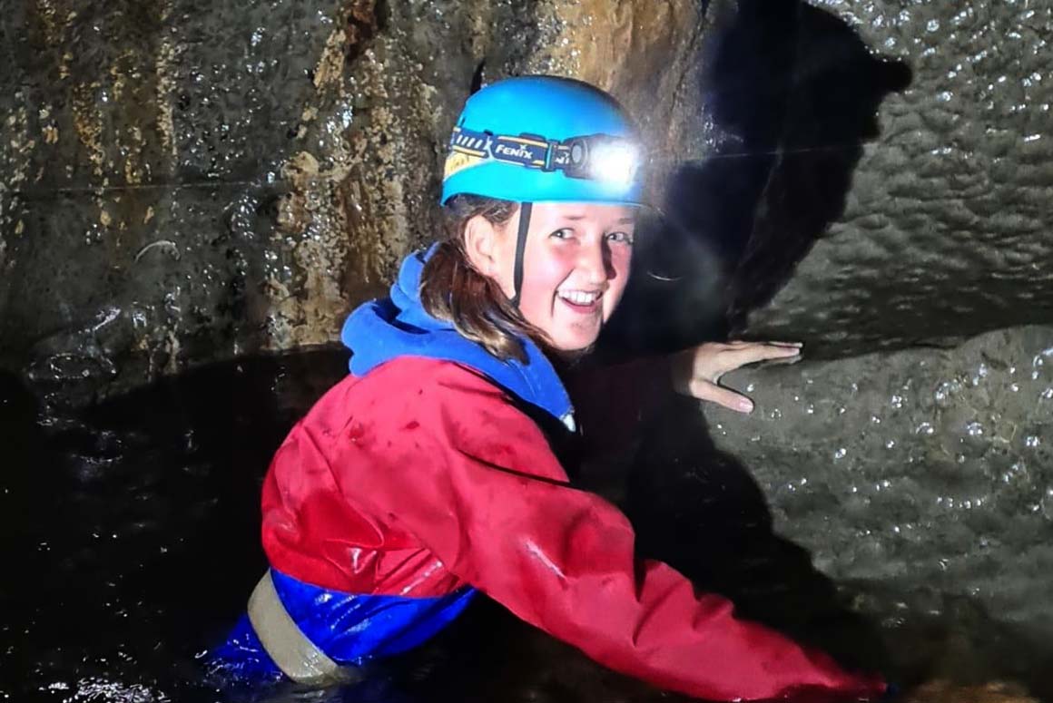 Sedbergh Summer School students caving underground